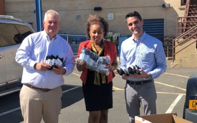 DR Bank Donates 500 Socks to New Covenant Center